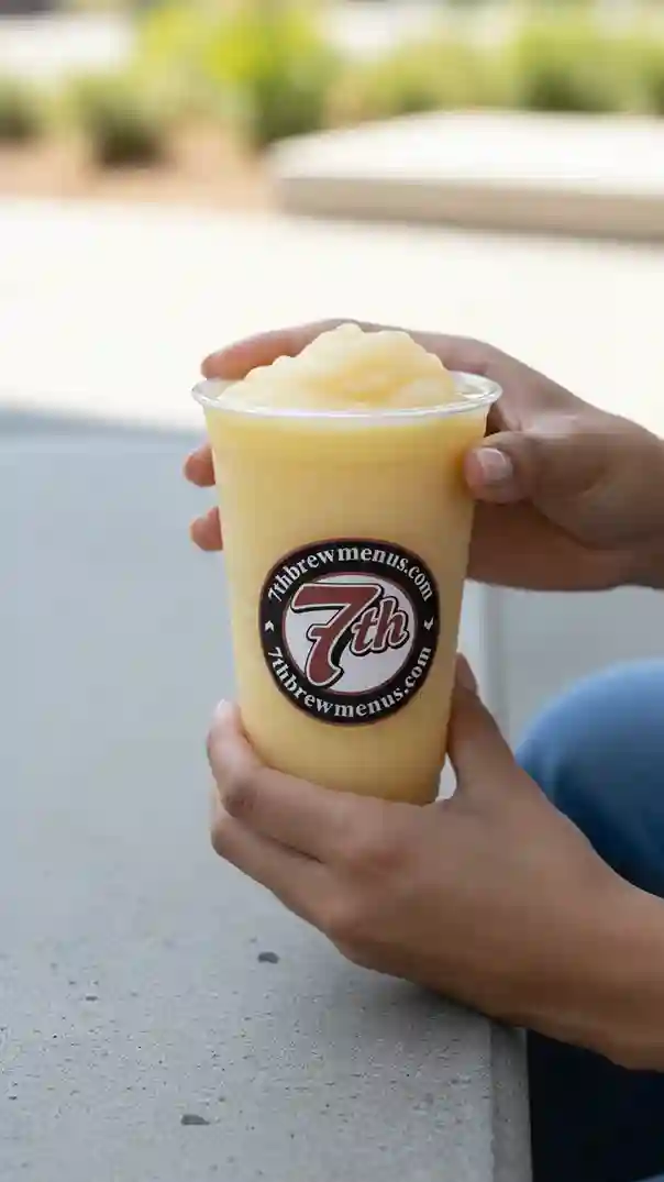 Tigers Blood Pina Colada Smoothie from the 7 Brew menu, shown iced in a clear cup.